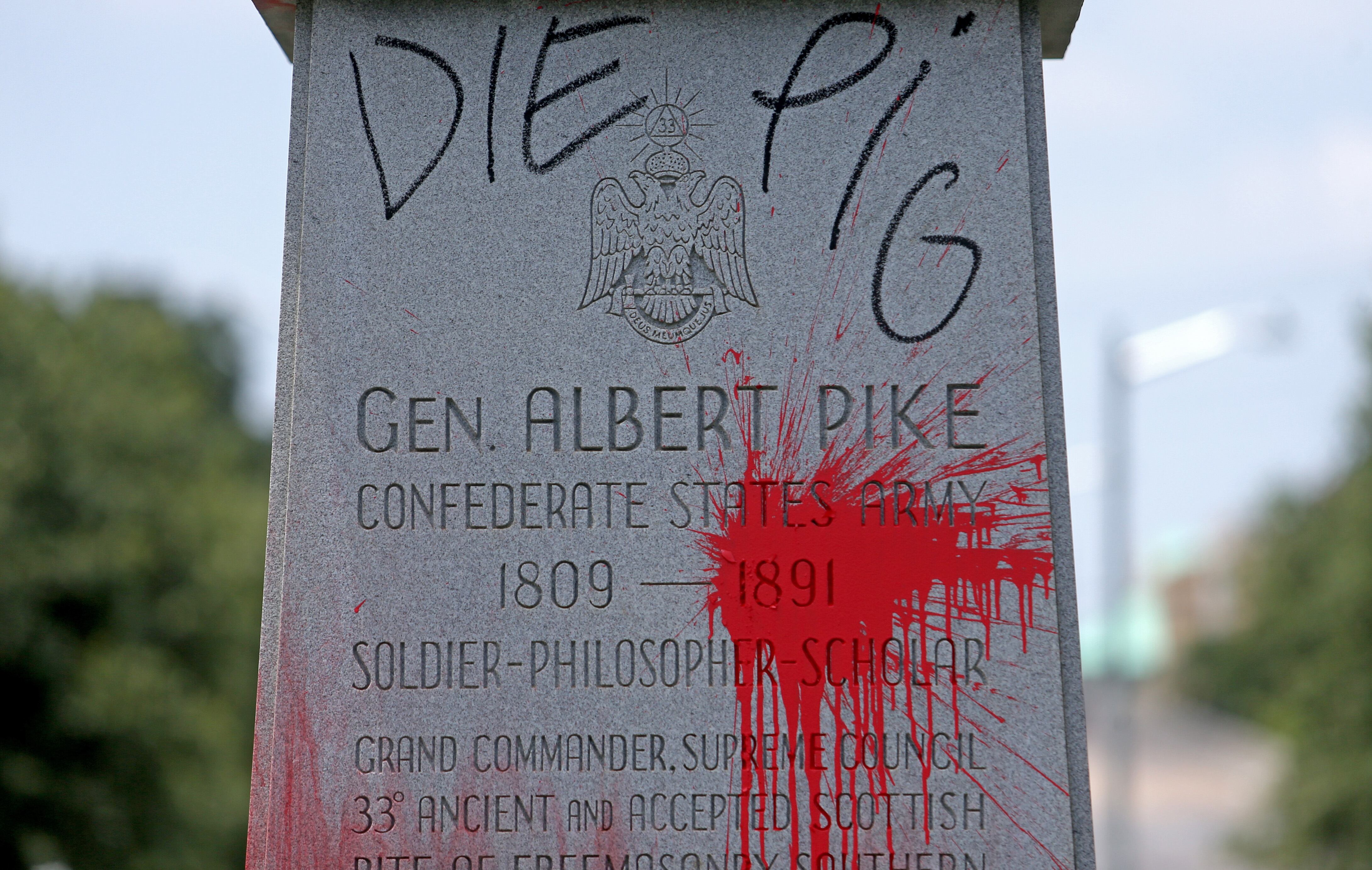 NEW ORLEANS, LA - JULY 10: The statue of Confederate General Albert Pike located on the neutral ground of South Jefferson Davis Parkway was spray-painted and covered with a white hood earlier this week and photographed on July 10, 2020 in New Orleans, Louisiana. The statue, one of several vandalized this week, was one of many located throughout New Orleans that protestors say celebrate white supremacy. (Photo by Michael DeMocker/Getty Images)