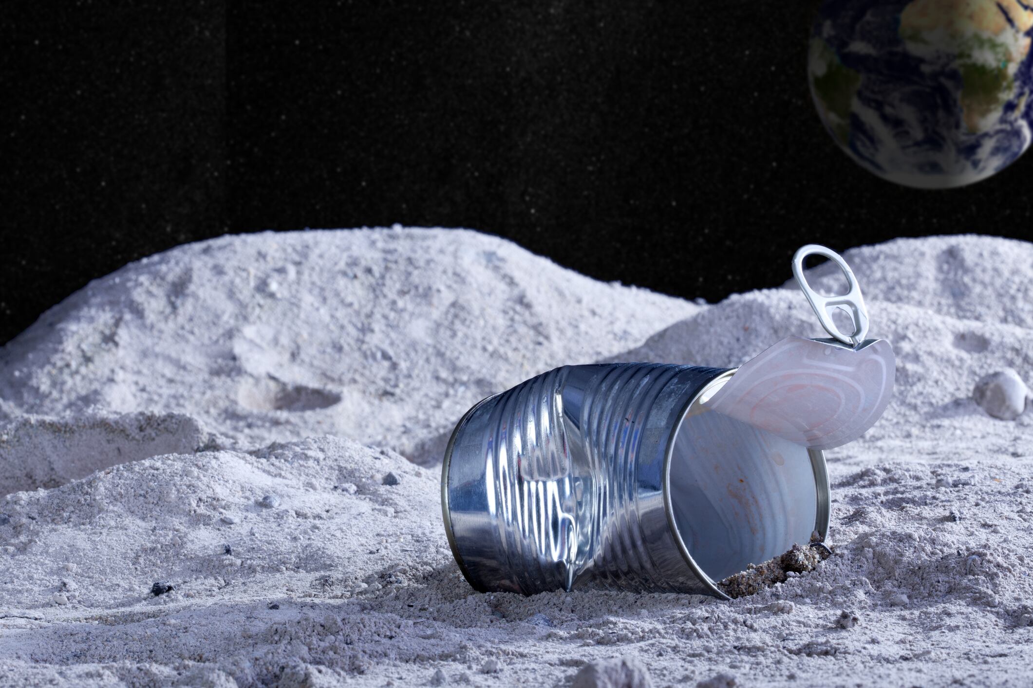 An aluminum can left over the moon surface.