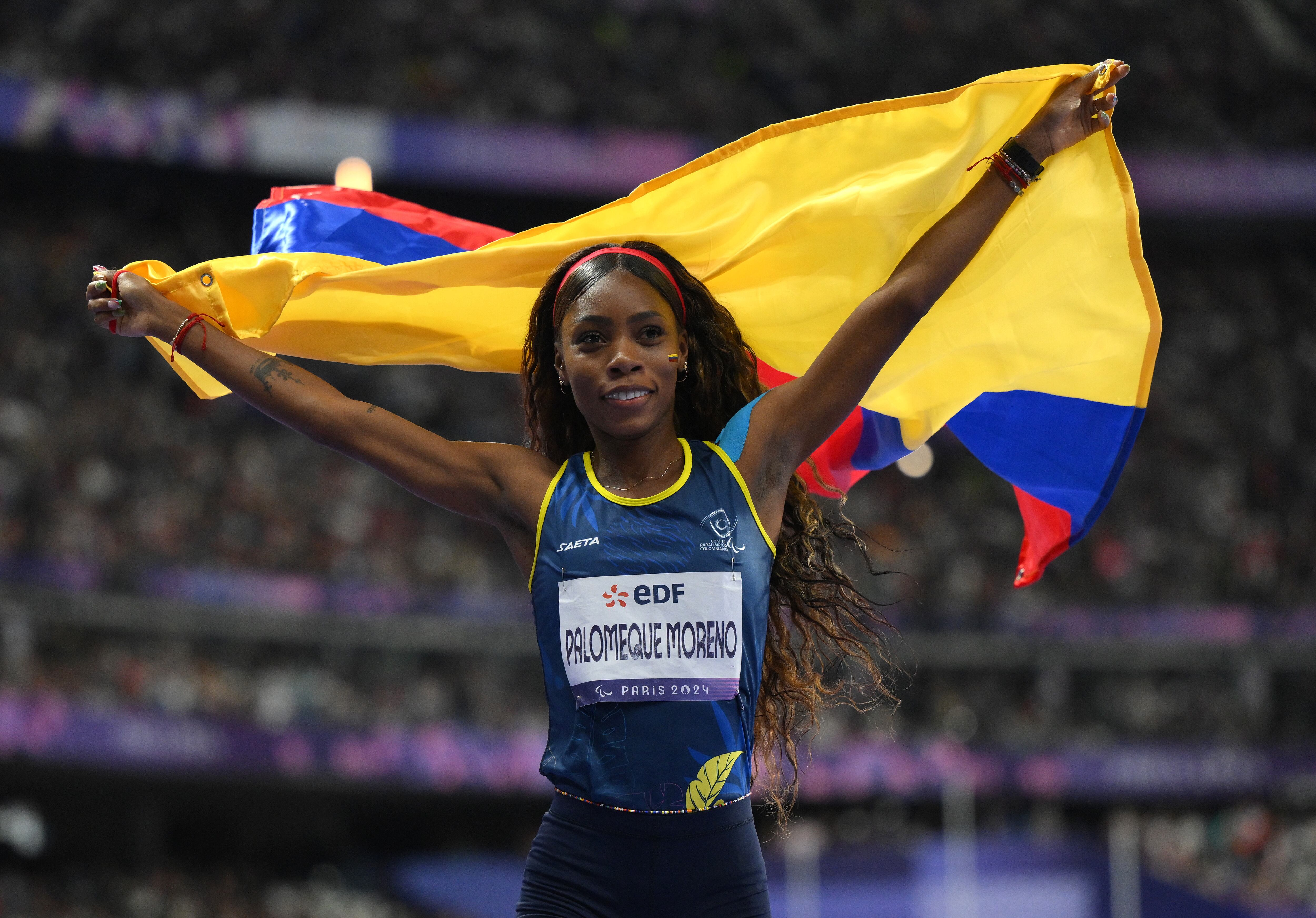 PARIS, FRANCE - SEPTEMBER 07: Karen Tatiana Palomeque Moreno of Team Colombia celebrates after setting a World Record in the Women's 400m T38 Final on day ten of the Paris 2024 Summer Paralympic Games at Stade de France on September 07, 2024 in Paris, France. (Photo by David Ramos/Getty Images)