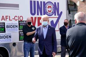 Democratic presidential candidate former Vice President Joe Biden meets with union leaders outside at the AFL-CIO headquarters in Harrisburg, Pa., Monday, Sept. 7, 2020. (AP Photo/Carolyn Kaster)