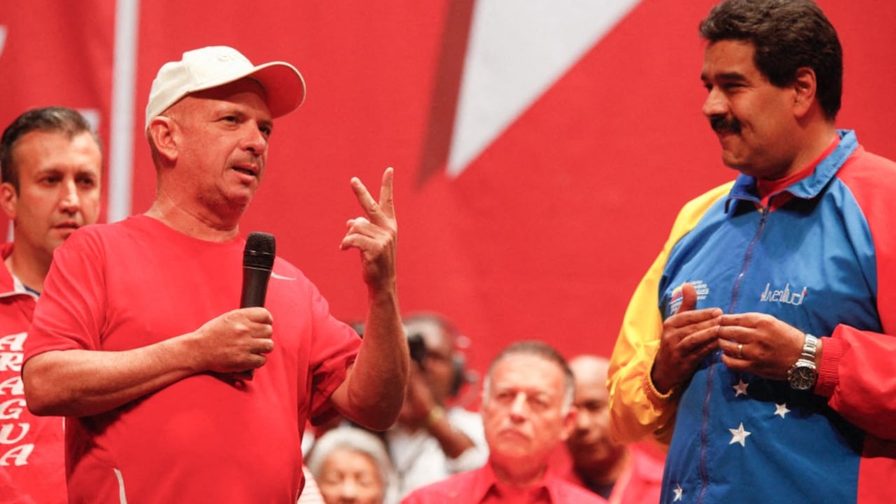 Hugo Carvajal y Nicolás Maduro