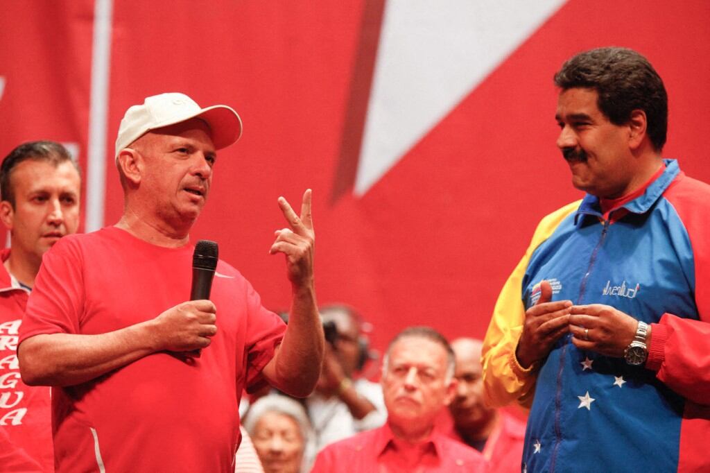 Hugo Carvajal y Nicolás Maduro