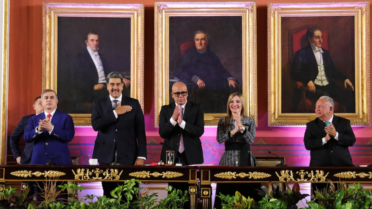 Handout picture released by the Venezuelan Presidency press office showing President Nicolas Maduro (2nd L) next to (L to R) attorney general Tarek William Saab, the president of the National Assembly Jorge Rodriguez, the president of the Supreme Court of Justice Caryslia Rodr�guez, and the president of the National Electoral Council (CNE), Elvis Amoroso, before taking the oath during the presidential inauguration at the Capitolio -home of the National Assembly- in Caracas on January 10, 2025. Maduro, in power since 2013, took the oath of office for a third term despite a global outcry that brought thousands out in protest on the ceremony's eve. (Photo by MARCELO GARCIA / Venezuelan Presidency / AFP) / RESTRICTED TO EDITORIAL USE - MANDATORY CREDIT AFP PHOTO / VENEZUELAN PRESIDENCY PRESS OFFICE - NO MARKETING - NO ADVERTISING CAMPAIGNS - DISTRIBUTED AS A SERVICE TO CLIENTS