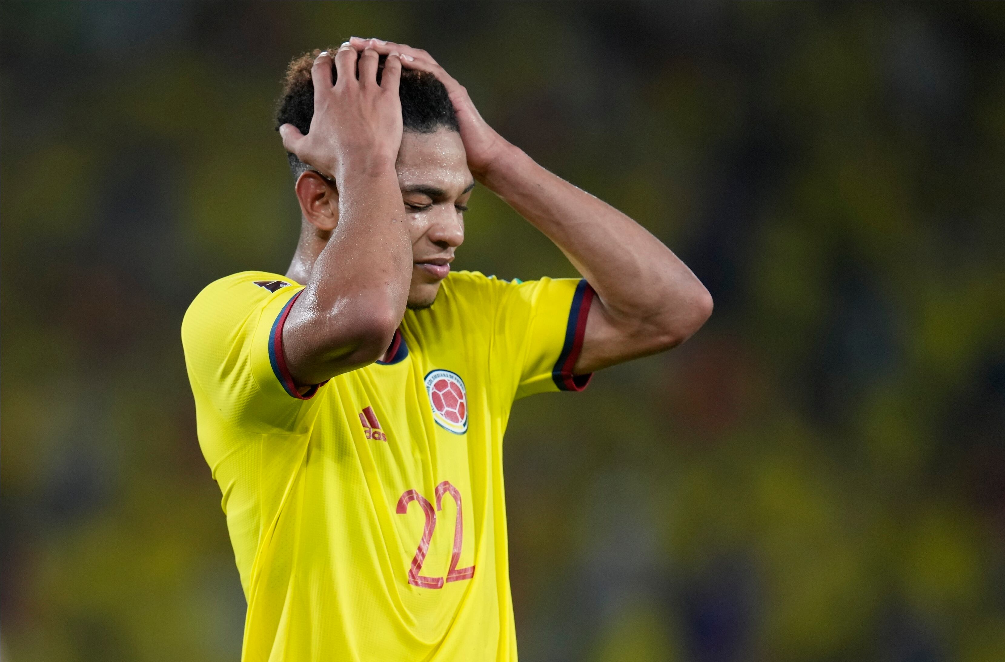 Colombia's Diego Valoyes reacts after missing a shot on goal during a qualifying soccer match for the FIFA World Cup Qatar 2022 against Paraguay, at Metropolitano stadium in Barranquilla, Colombia, Tuesday, Nov. 16, 2021. (AP Photo/Fernando Vergara)