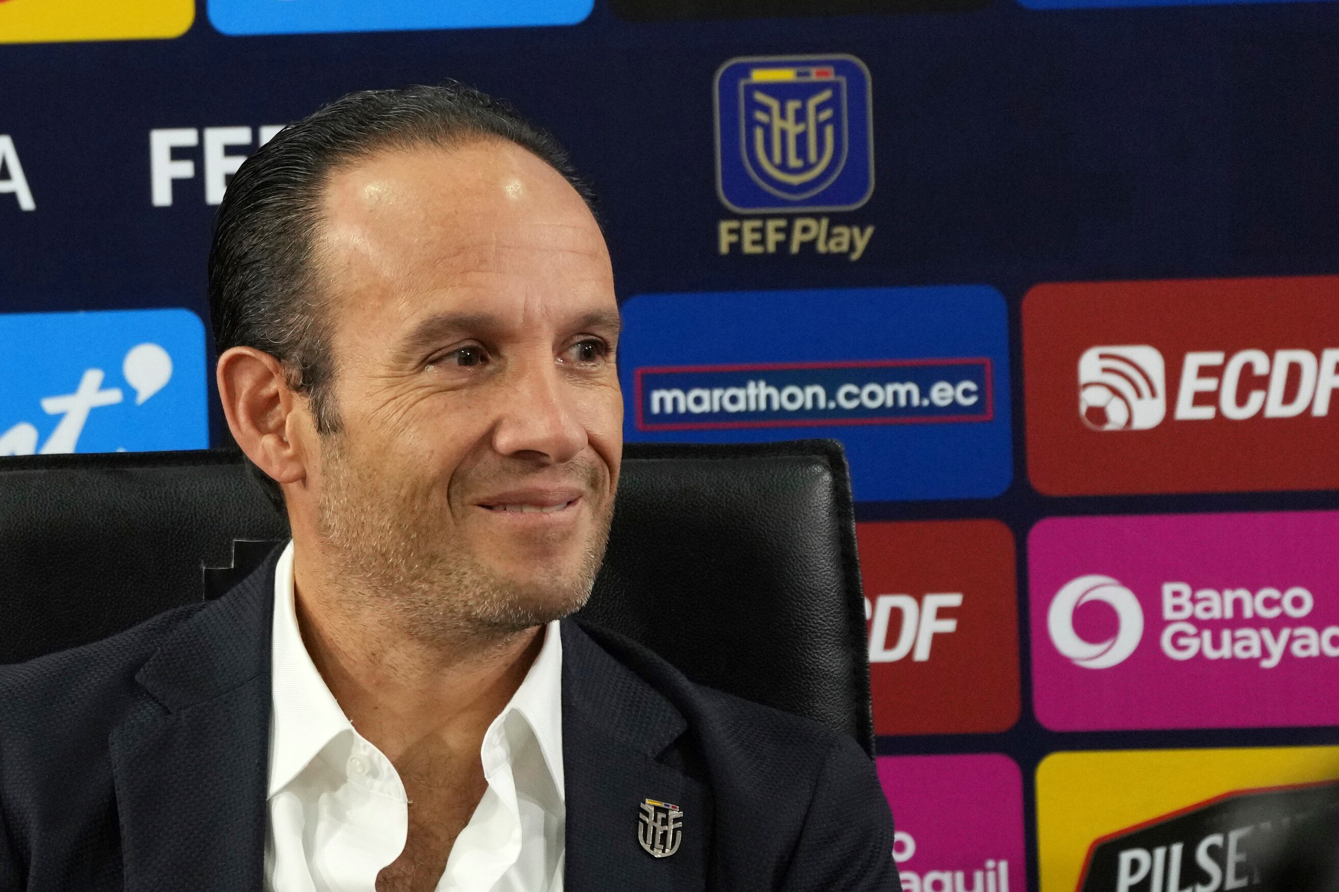 Francisco Egas, president of the Ecuadorian Football Federation, gives a press conference after the FIFA Disciplinary Commission dismissed all charges against Ecuador, in Quito, Ecuador, Friday, June 10, 2022. The Chilean Soccer Association had been challenging Ecuador's place at the upcoming finals tournament and asked FIFA to investigate its claim that Ecuador's player Byron Castillo is actually Colombian and not entitled to have played in qualifying games. (AP Photo/Dolores Ochoa)