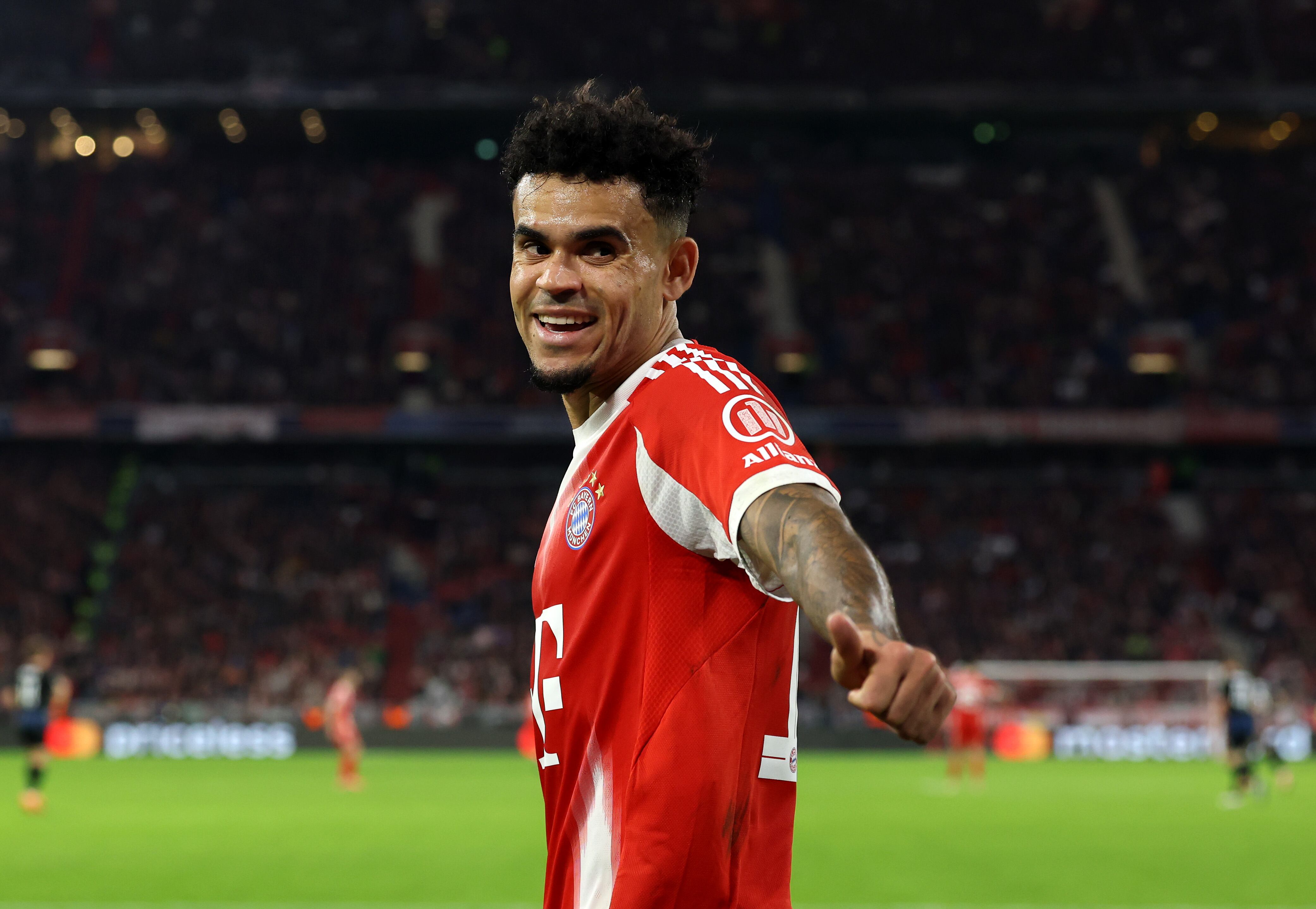 MUNICH, GERMANY - OCTOBER 22: Luis Diaz of Bayern Munich celebrates after teammate Nicolas Jackson (not pictured) scores his team's fourth goal during the UEFA Champions League 2025/26 League Phase MD3 match between FC Bayern München and Club Brugge KV at Football Arena Munich on October 22, 2025 in Munich, Germany. (Photo by Alexander Hassenstein/Getty Images)