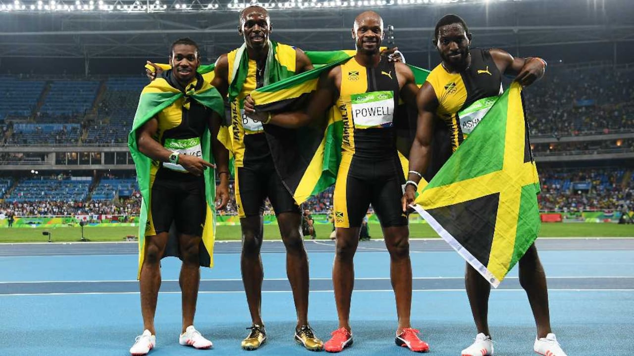 Usain Bolt y Jamaica en su celebración. FRANCK FIFE / AFP