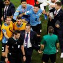 Soccer Football - FIFA World Cup Qatar 2022 - Group H - Ghana v Uruguay - Al Janoub Stadium, Al Wakrah, Qatar - December 2, 2022 Uruguay players remonstrate with the referee Daniel Siebert after the match REUTERS/Albert Gea