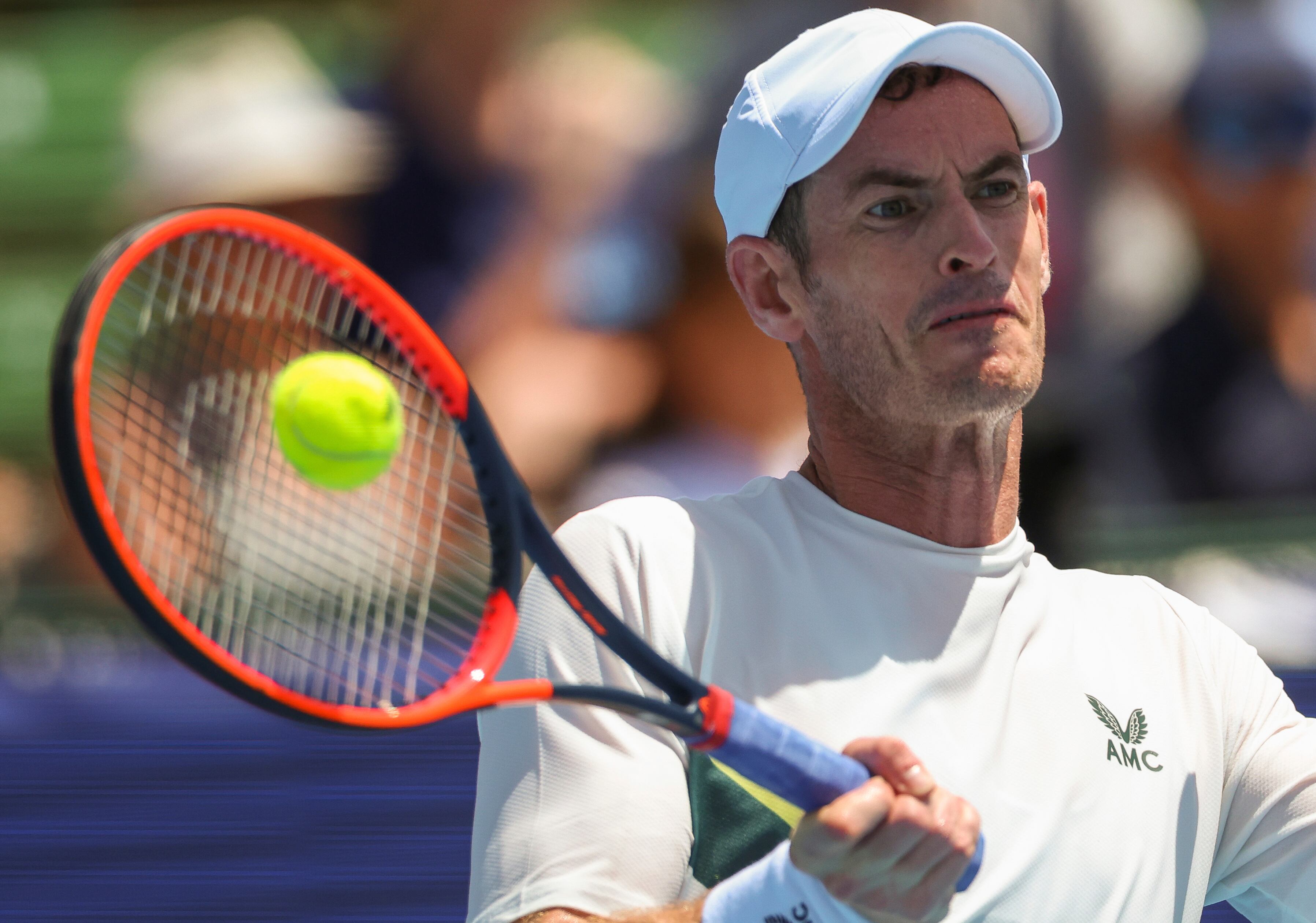 Britain's Andy Murray plays a forehand return to Australia's Alex de Miner during their match at the Kooyong Classic in Melbourne, Australia, Thursday, Jan. 12, 2023. (AP/Asanka Brendon Ratnayake)