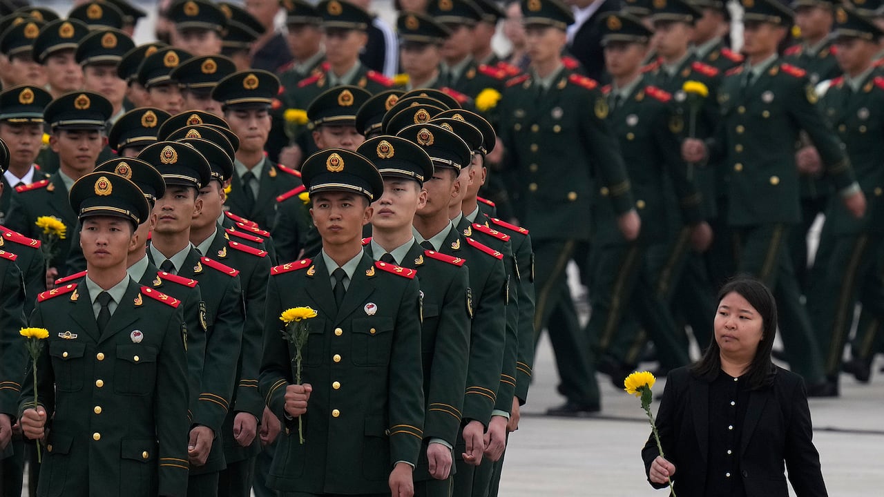 Ceremonia para conmemorar el Día de los Mártires en la Plaza de Tiananmen en Beijing, Foto AP / Andy Wong