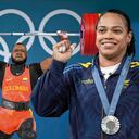 Yeison Lopes of Colombia competes during the men's 89kg weightlifting event, at the 2024 Summer Olympics, Friday, Aug. 9, 2024, in Paris, France. (AP Photo/Kin Cheung)