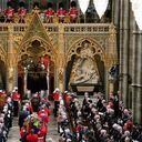 The coffin of Britain's Queen Elizabeth II is carried into Westminster Abbey ahead of her State Funeral, in London, Monday Sept. 19, 2022. The Queen, who died aged 96 on Sept. 8, will be buried at Windsor alongside her late husband, Prince Philip, who died last year. (Danny Lawson/Pool Photo via AP)