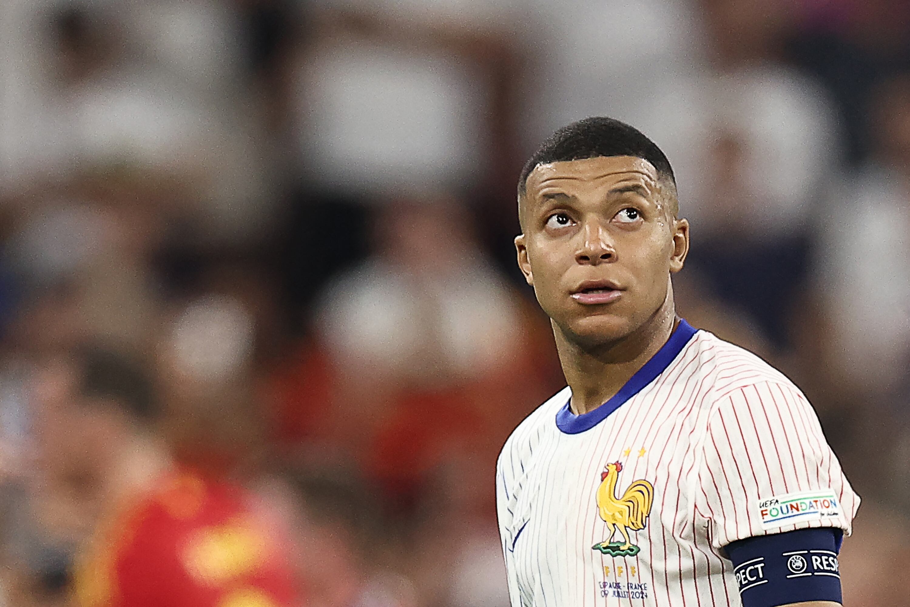 France's forward #10 Kylian Mbappe reacts after losing the UEFA Euro 2024 semi-final football match between Spain and France at the Munich Football Arena in Munich on July 9, 2024. (Photo by FRANCK FIFE / AFP)