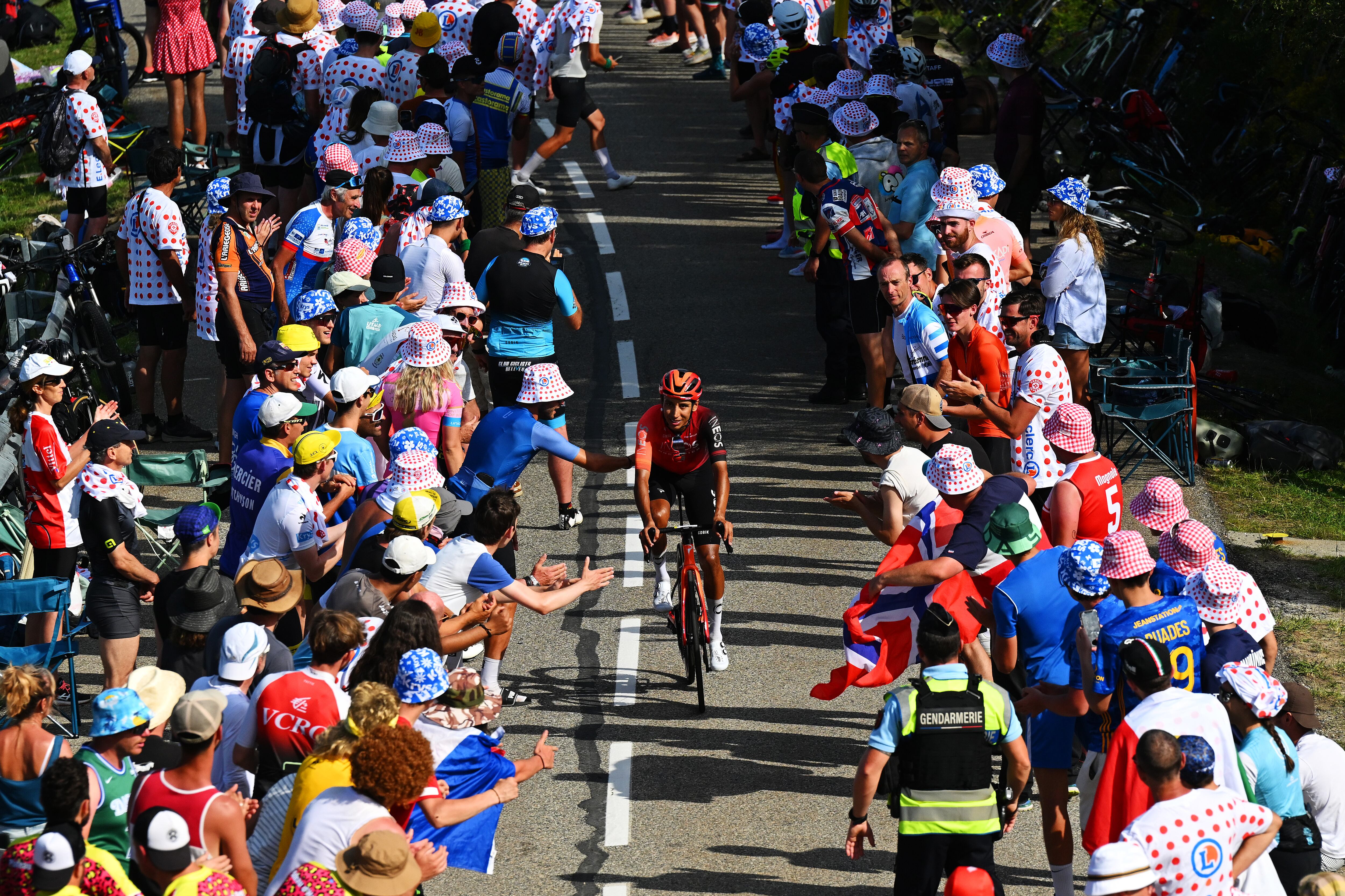 PLATEAU DE BEILLE, FRANCE - JULY 14: Egan Bernal of Colombia and Team INEOS Grenadiers competes climbing the Plateau de Beille (1782m) while fans cheer during the 111th Tour de France 2024, Stage 15 a 197.7km stage from Loudenvielle to Plateau de Beille 1782m / #UCIWT / on July 14, 2024 in Plateau de Beille, France. (Photo by Tim de Waele/Getty Images)