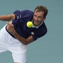 Daniil Medvedev of Russia serves in his men's quarterfinal match against Hubert Hurkacz of Poland, at the Miami Open tennis tournament, Thursday, March 31, 2022, in Miami Gardens, Fla. (AP Photo/Rebecca Blackwell)