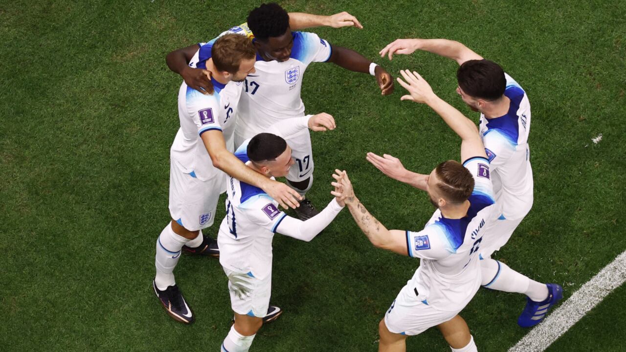 Soccer Football - FIFA World Cup Qatar 2022 - Round of 16 - England v Senegal - Al Bayt Stadium, Al Khor, Qatar - December 4, 2022 England's Harry Kane celebrates scoring their second goal with teammates REUTERS/Peter Cziborra