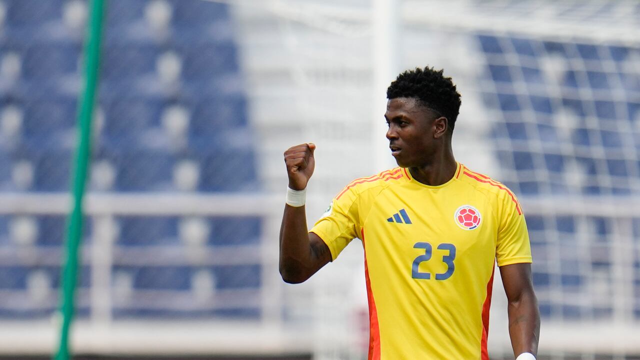 Colombia's Neiser Villarreal celebrates scoring his side's opening goal against Uruguay during a South American U-20 Championship final round soccer match in Puerto La Cruz, Venezuela, Sunday, Feb. 16, 2025. (AP Photo/Matias Delacroix)