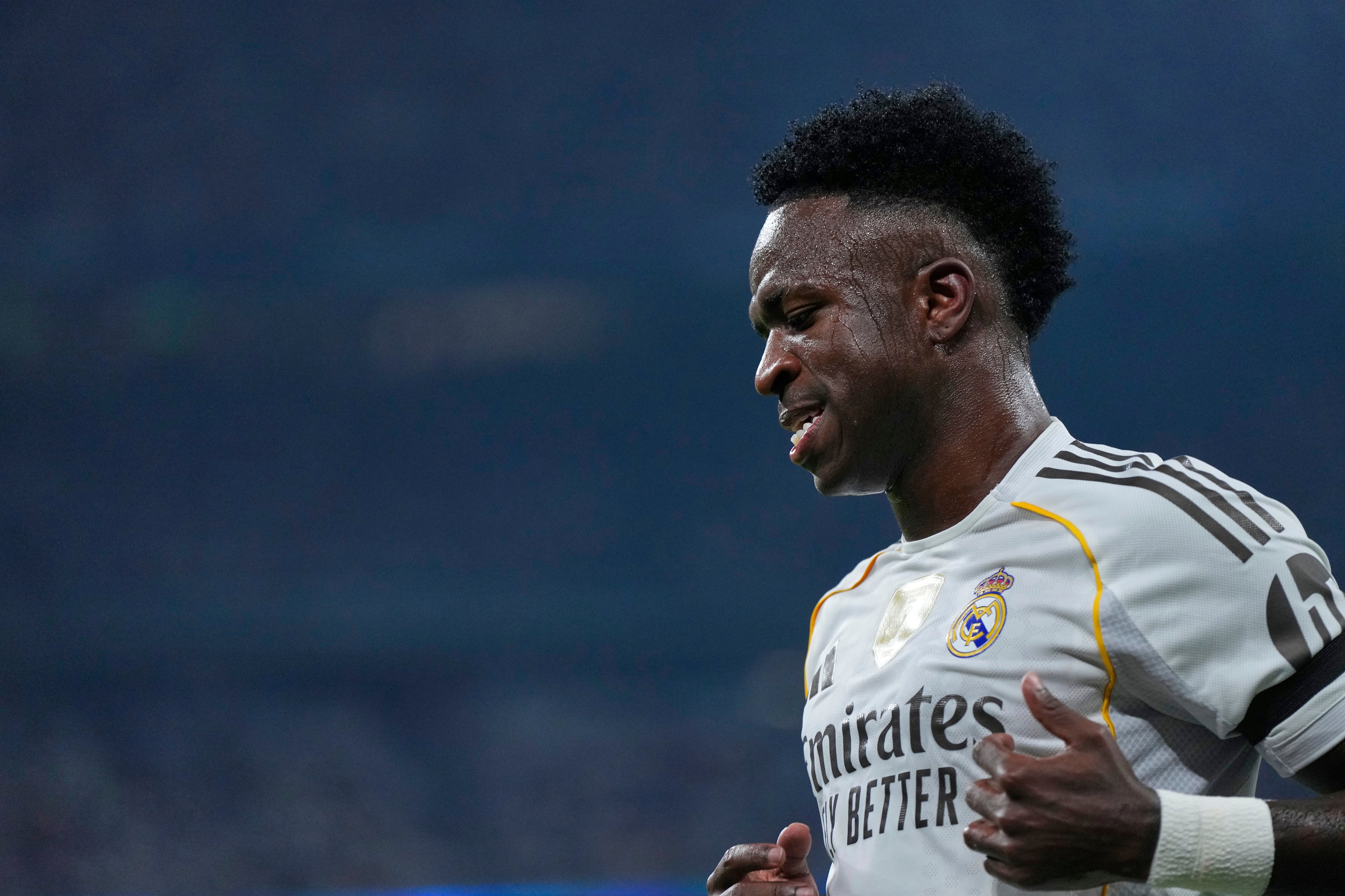 Real Madrid's Vinicius Junior runs during the La Liga soccer match between Real Madrid and Osasuna in Madrid, Spain, Tuesday, Aug. 19, 2025. (AP Photo/Manu Fernandez)