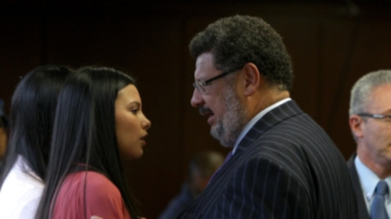 Laura Moreno junto a su abogado Jaime Granados.