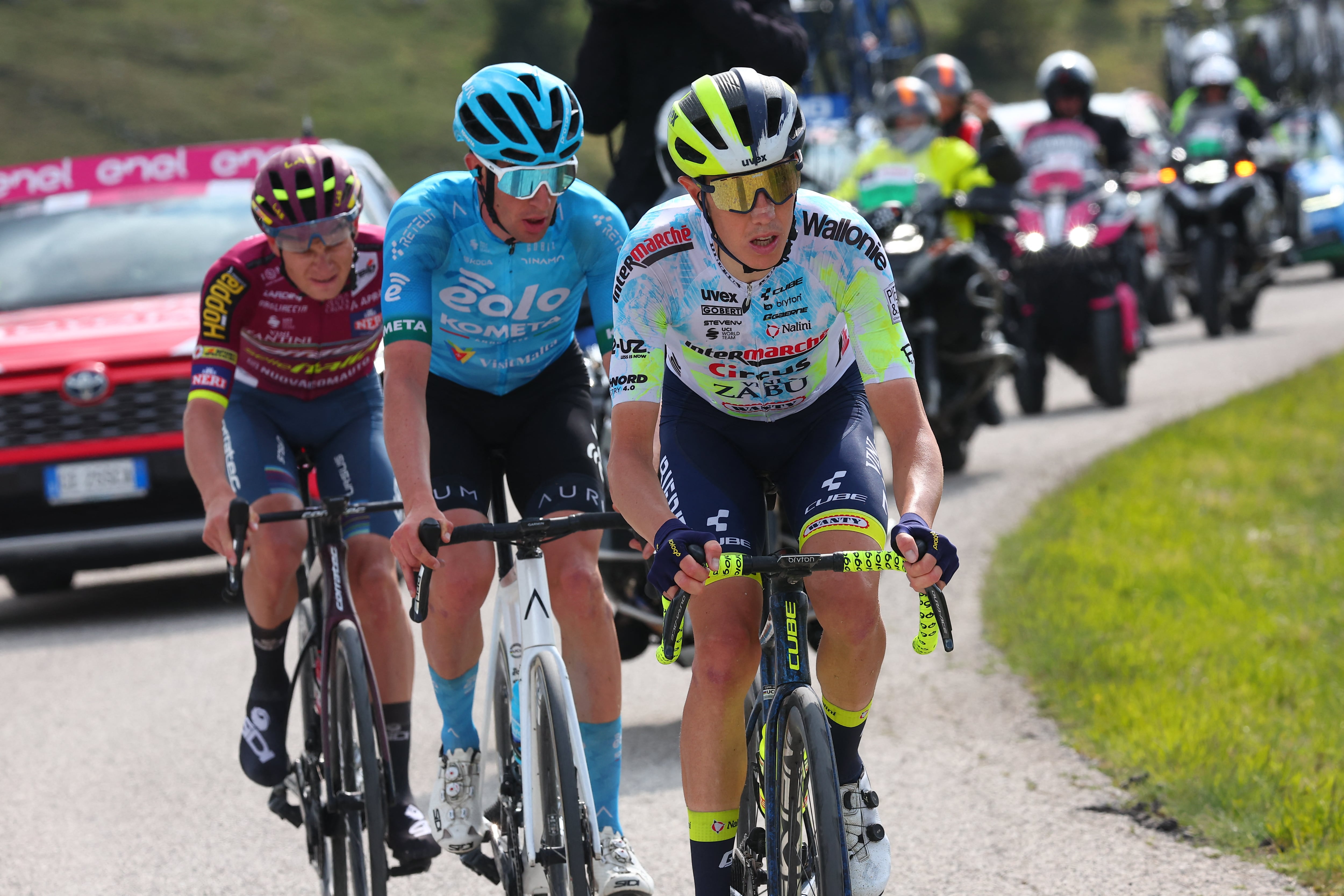 Breakaway riders (From L) Team Corratec - Selle Italia's Czech rider Karel Vacek, EOLO-Kometa's Italian  rider Davide Bais and Intermarche - Circus - Wanty's Italian rider Simone Petilli cycle in the final ascent to Calascio in the Apennine mountains during the seventh stage of the Giro d'Italia 2023 cycling race, 218 km between Capua and Gran Sasso d'Italia, on May 12, 2023. (Photo by Luca Bettini / AFP)