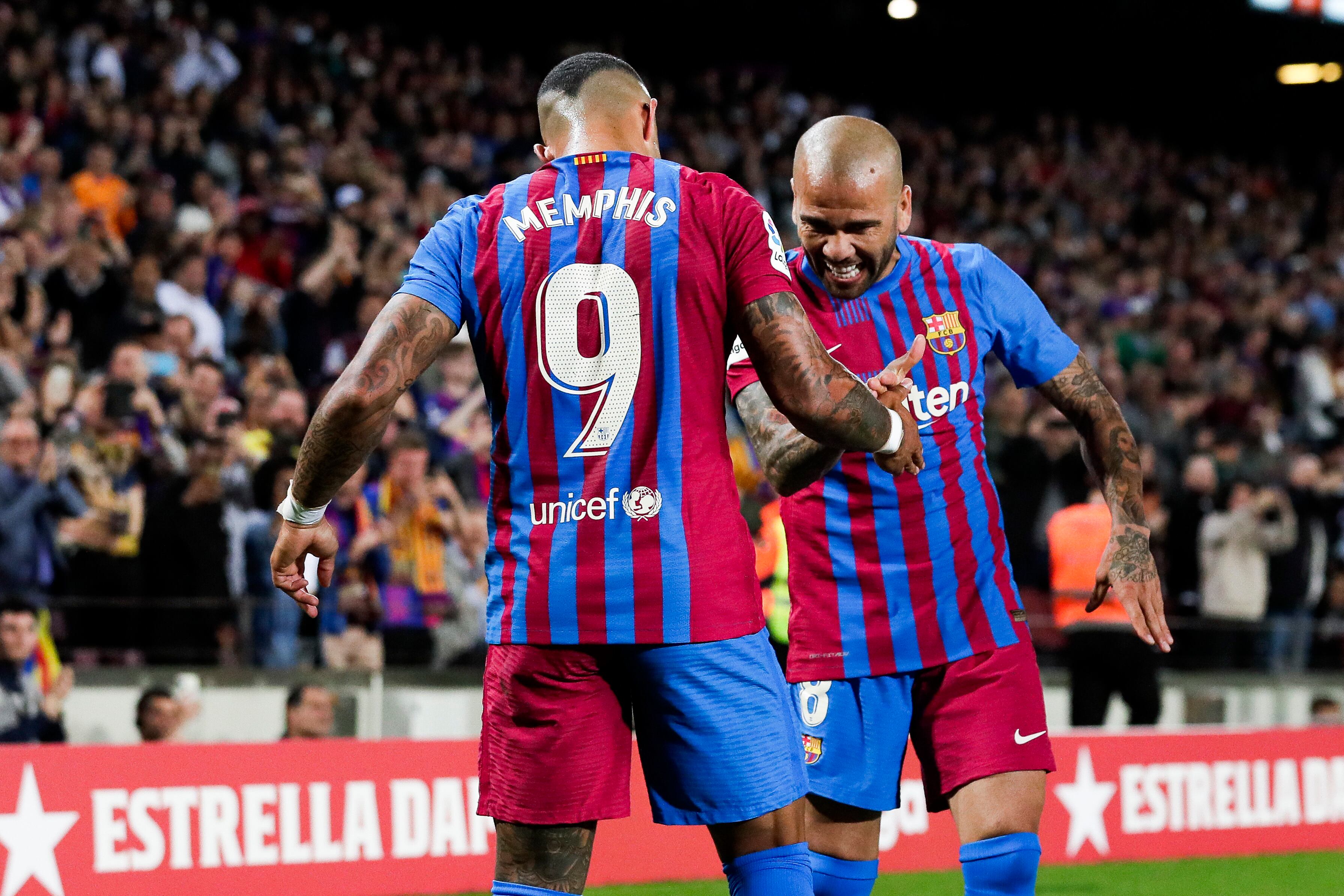 BARCELONA, SPAIN - MAY 1: Memphis Depay of FC Barcelona celebrates goal 1-0 with Dani Alves of FC Barcelona during the La Liga Santander  match between FC Barcelona v Real Mallorca at the Camp Nou on May 1, 2022 in Barcelona Spain (Photo by David S. Bustamante/Soccrates/Getty Images)