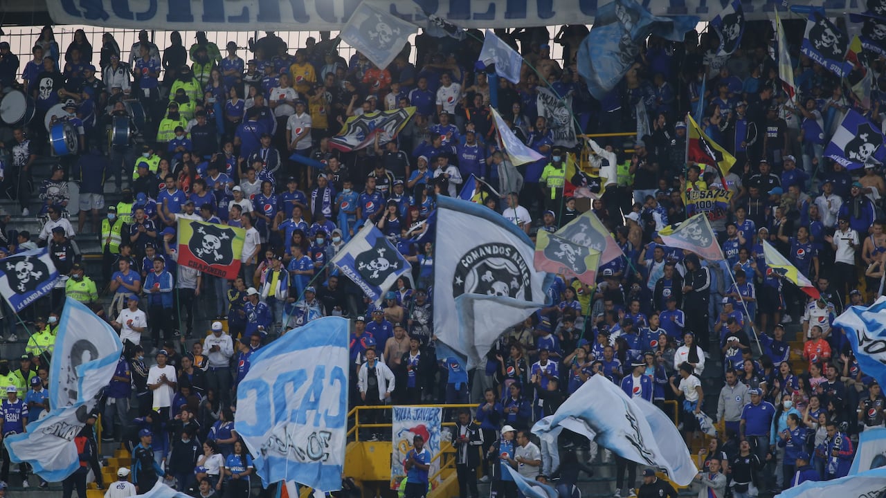 Millonarios fans support their team during the Colombian BetPlay League match between Millonarios and Independiente Santa Fe at Estadio Nemesio Camacho in Bogota, Colombia on April 24, 2022. Final score 2-1. (Photo by Daniel Garzon Herazo/NurPhoto via Getty Images)