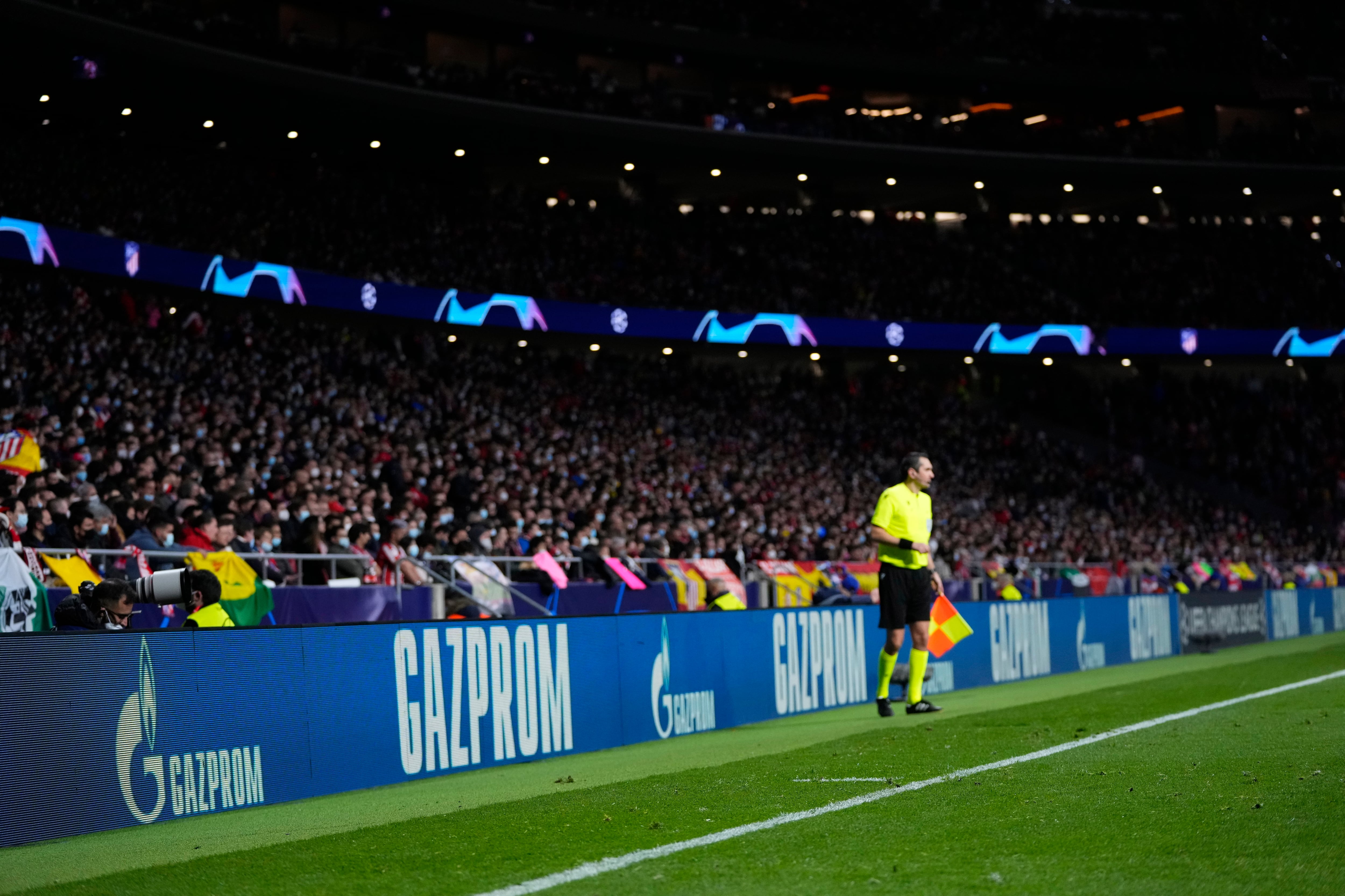Spectators watch the Champions League, round of 16, first leg soccer match between Atletico Madrid and Manchester United at the Wanda Metropolitano stadium in Madrid, Spain, Wednesday, Feb. 23, 2022. (AP Photo/Manu Fernandez)