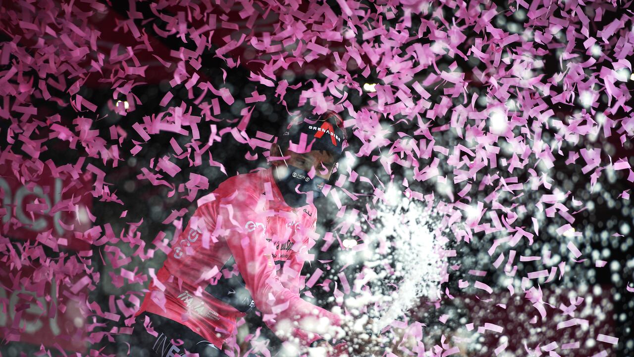 Colombia's Egan Bernal celebrates retaining the pink jersey of leader of the race after the 20th stage of the Giro d'Italia cycling race, from Verbania to Alpe Motta, Italy, Saturday, May 29, 2021. (Marco Alpozzi/LaPresse via AP)