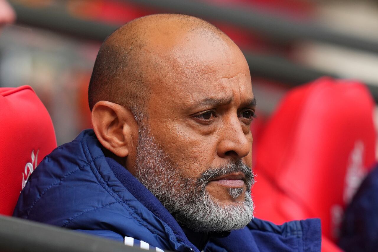 FILE =Nottingham Forest's head coach Nuno Espirito Santo sits before the English FA Cup semifinal soccer match between Nottingham Forest and Manchester City at Wembley stadium in London, Sunday, April 27, 2025. (AP Photo/Kirsty Wigglesworth,File)