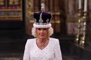 LONDON, ENGLAND - MAY 06: Queen Camilla stands after being crowned by Archbishop of Canterbury Justin Welby during her coronation ceremony in Westminster Abbey, on May 6, 2023 in London, England. The Coronation of Charles III and his wife, Camilla, as King and Queen of the United Kingdom of Great Britain and Northern Ireland, and the other Commonwealth realms takes place at Westminster Abbey today. Charles acceded to the throne on 8 September 2022, upon the death of his mother, Elizabeth II. (Photo by Richard Pohle - WPA Pool/Getty Images)