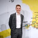 PARIS, FRANCE - OCTOBER 27: Tadej Pogacar of Slovenia and UAE Team Emirates and the map showing the route of the men's race during the 110th Tour de France 2023 and 2nd Tour de France Femmes 2023 - Route Presentation / #TDF2023 / #TDFF2023 / on October 27, 2022 in Paris, France. (Photo by Alex Broadway/Getty Images)