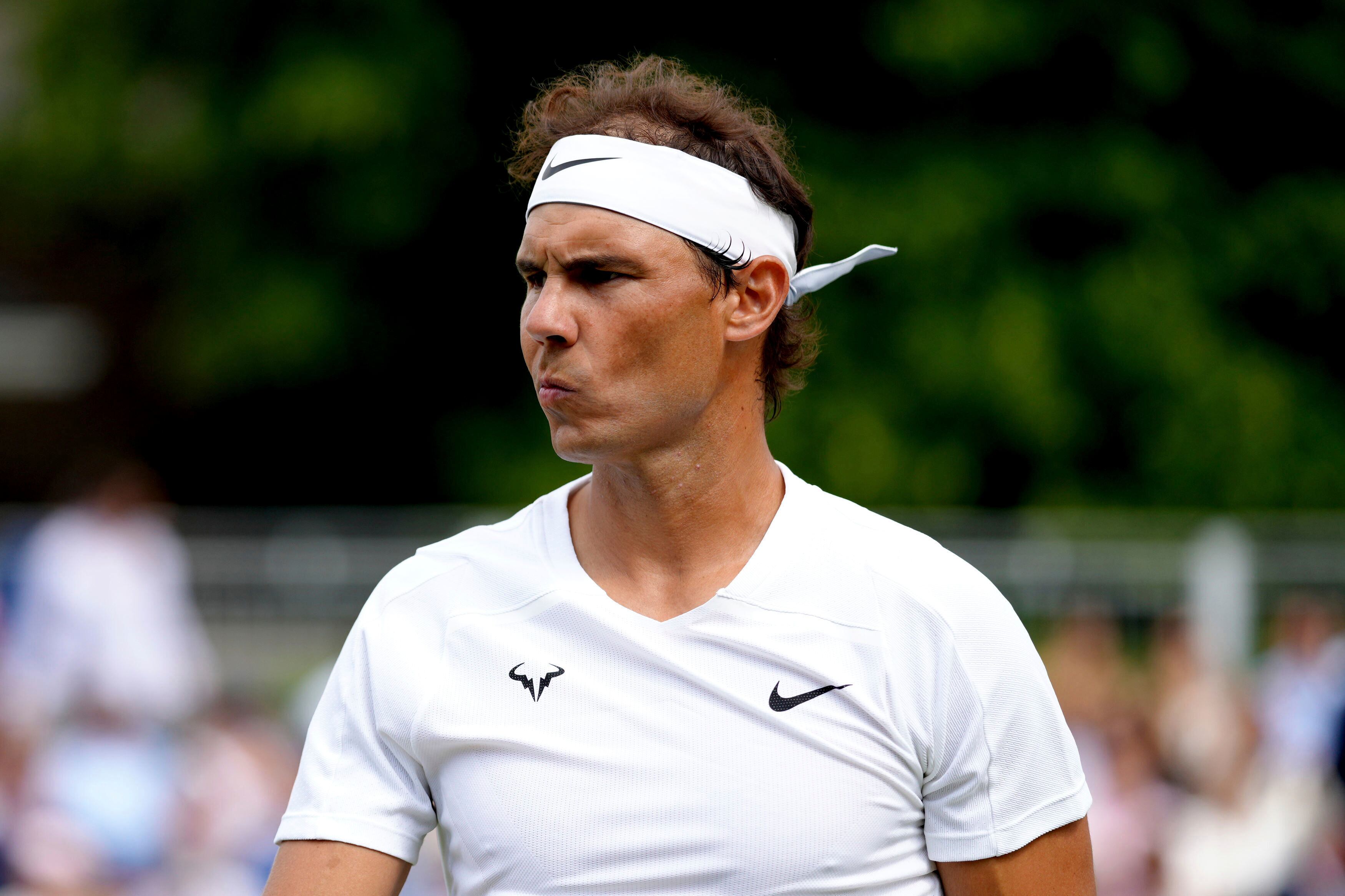 Spain's Rafael Nadal during his match against Canada's Felix Auger Aliassime on day four of the Giorgio Armani Tennis Classic at The Hurlingham Club, London, Friday June 24, 2022. (John Walton/PA via AP)