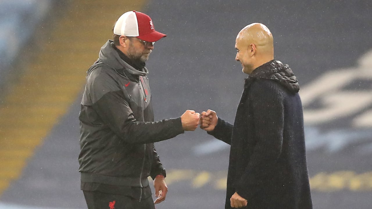 Liverpool manager Jurgen Klopp (left) and Manchester City manager Pep Guardiola after the final whistle during the Premier League match at the Etihad Stadium, Manchester. (Photo by Getty Images/Martin Rickett/PA Images)