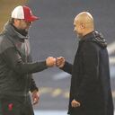 Liverpool manager Jurgen Klopp (left) and Manchester City manager Pep Guardiola after the final whistle during the Premier League match at the Etihad Stadium, Manchester. (Photo by Martin Rickett/PA Images via Getty Images)