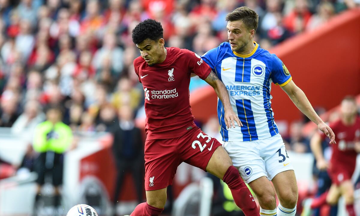 LIVERPOOL, ENGLAND - OCTOBER 01: ( THE SUN OUT,THE SUN ON SUNDAY OUT ) Luis Diaz of Liverpool with Brighton & Hove Albion's Joel Veltman during the Premier League match between Liverpool FC and Brighton & Hove Albion at Anfield on October 01, 2022 in Liverpool, England. (Photo by Getty Images/John Powell/Liverpool FC)