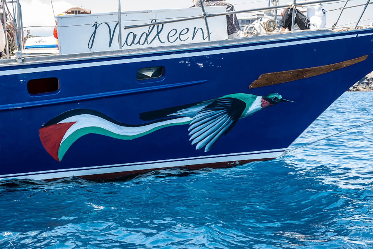 CATANIA, ITALY - JUNE 01: The bow of the Madleen ship, featuring an illustration inspired by the Palestinian flag, ready to set off from the port of San Giovanni Li Cuti on June 01, 2025 in Catania, Italy. Swedish activist Greta Thunberg is among those who will attempt to sail to Gaza on a boat organized by the Freedom Flotilla Coalition (FFC), in a bid to break Israel's blockade of the Palestinian territory. Freedom Flotilla had to abort a previous journey in early May after it said its boat came under attack by drones in international waters near Malta. (Photo by Fabrizio Villa/Getty Images)
