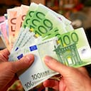 a handful of euros bills