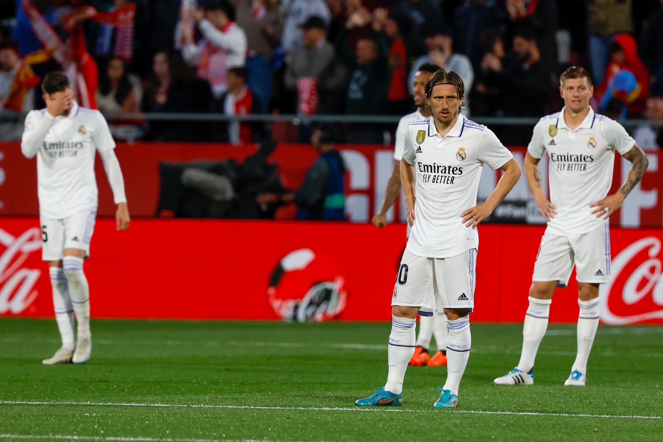 Real Madrid players react during a Spanish La Liga soccer match between Girona and Real Madrid, at the Montilivi stadium in Girona, Spain, Tuesday, April 25, 2023. (AP Photo/Joan Monfort)