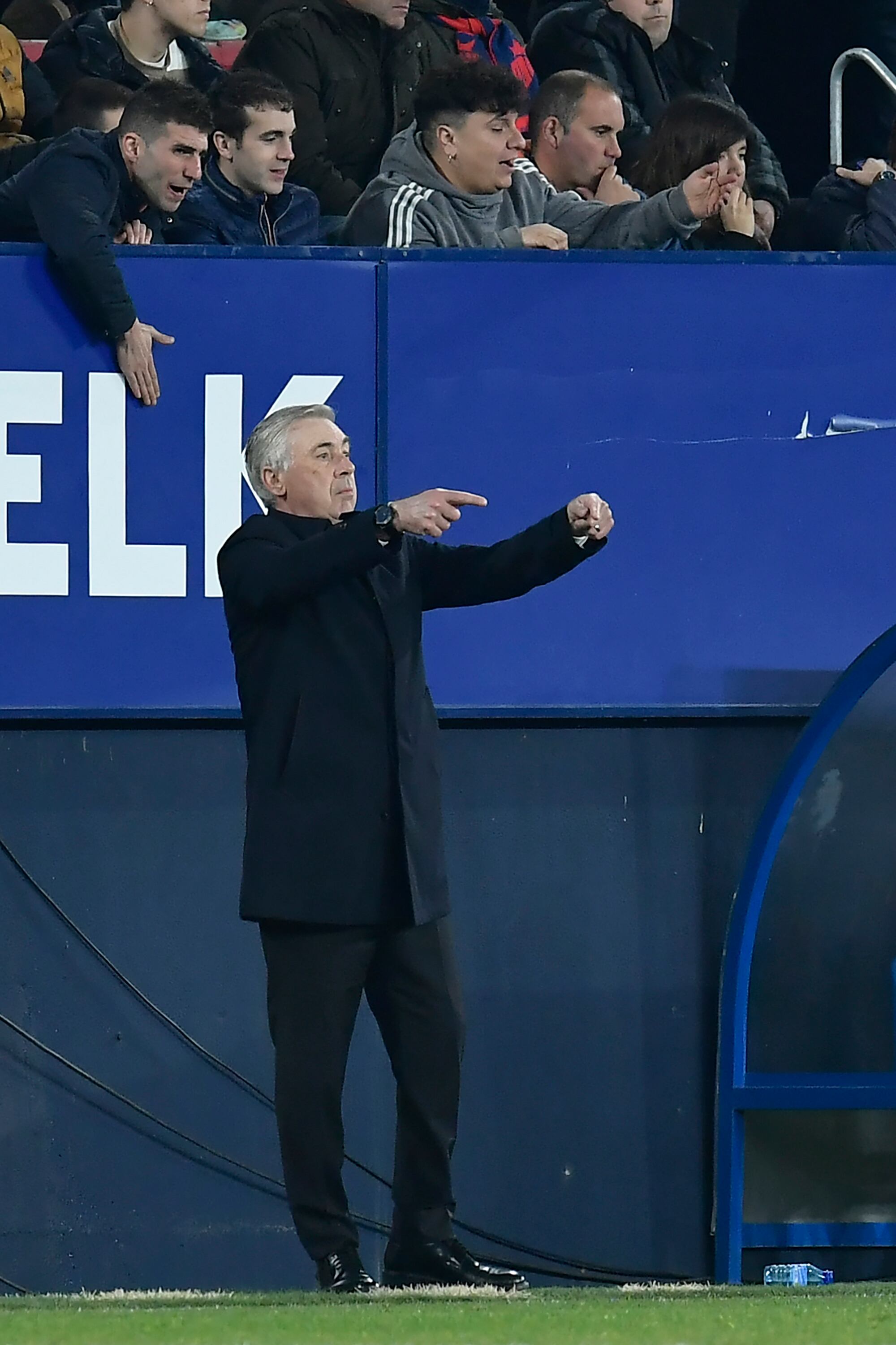 Real Madrid's head coach Carlo Ancelotti gestures during the Spanish La Liga soccer match between Osasuna and Real Madrid at El Sadar stadium in Pamplona, Spain, Saturday, Feb. 18, 2023. (AP Photo/Alvaro Barrientos)