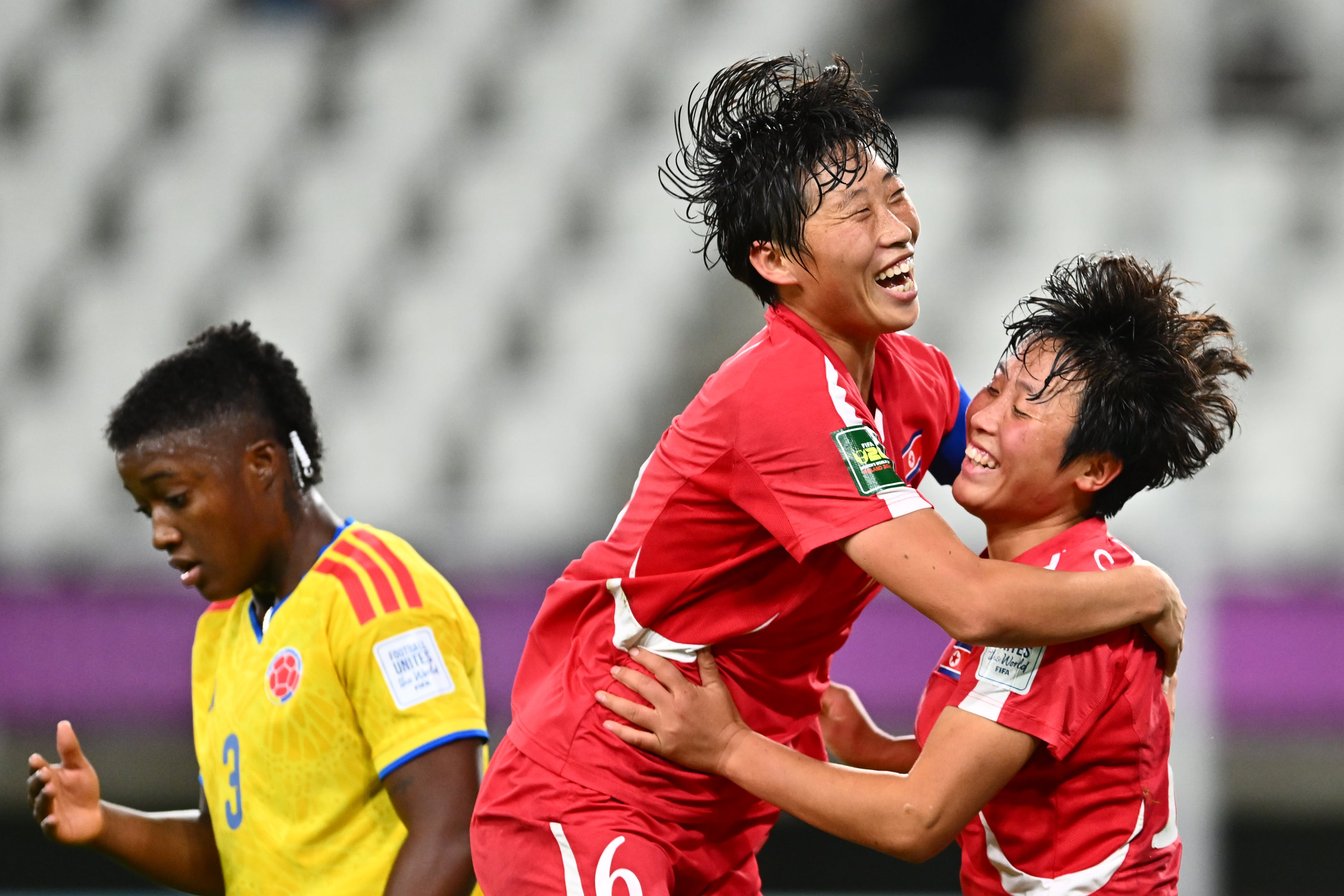LODZ, POLAND - SEPTEMBER 23: Rim Jong Choe of DPR Korea celebrates scoring her team’s second goal with teammate Ok I Pak during the FIFA U20 Womens World Cup semi-final match between DPR Korea and Colombia at Stadion Miejski LKS Lodz on September 23, 2026 in Lodz, Poland. (Photo by Mateusz Slodkowski - FIFA/FIFA via Getty Images)