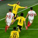 Erling Haaland de Dortmund celebra tras anotar el segundo gol de su equipo durante el partido de vuelta de octavos de final de la Liga de Campeones entre Borussia Dortmund y Sevilla FC en Dortmund, Alemania, el martes 9 de marzo de 2021 (AP Photo / Martin Meissner, Pool).