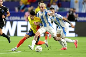 Colombia's forward #07 Luis Diaz fights for the ball with Argentina's midfielder #07 Rodrigo De Paul during the Conmebol 2024 Copa America tournament final football match between Argentina and Colombia at the Hard Rock Stadium, in Miami, Florida on July 14, 2024. (Photo by CHARLY TRIBALLEAU / AFP)