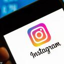 CHINA - 2022/07/25: In this photo illustration, the American photo and video-sharing social networking service owned by Facebook, the Instagram logo is displayed on a smartphone screen. (Photo Illustration by Budrul Chukrut/SOPA Images/LightRocket via Getty Images)