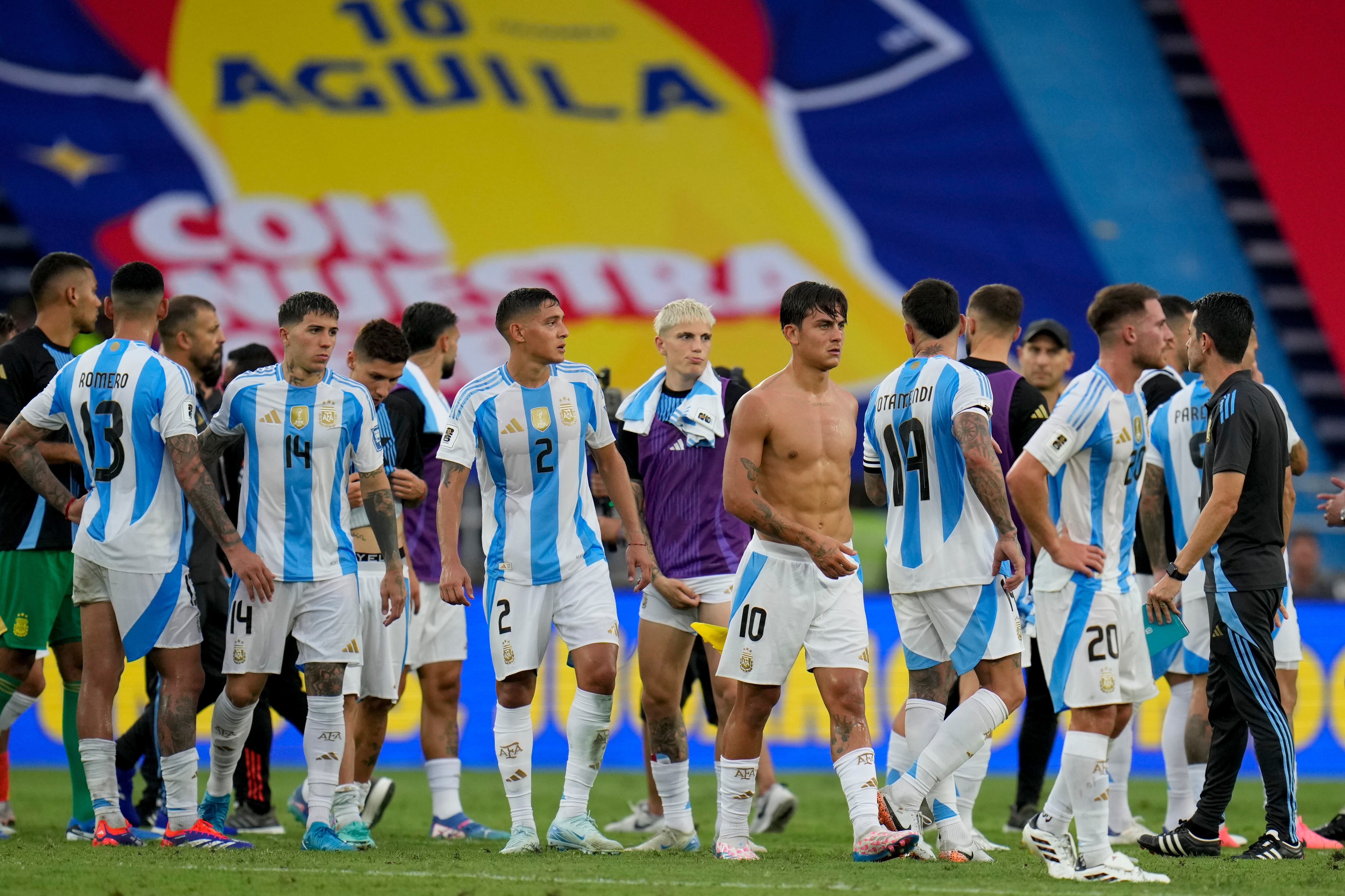 Argentina's players leave the field after a qualifying soccer match against Colombia for the FIFA World Cup 2026 at the Metropolitano Roberto Melendez stadium in Barranquilla, Colombia, Tuesday, Sept. 10, 2024. (AP Photo/Fernando Vergara)