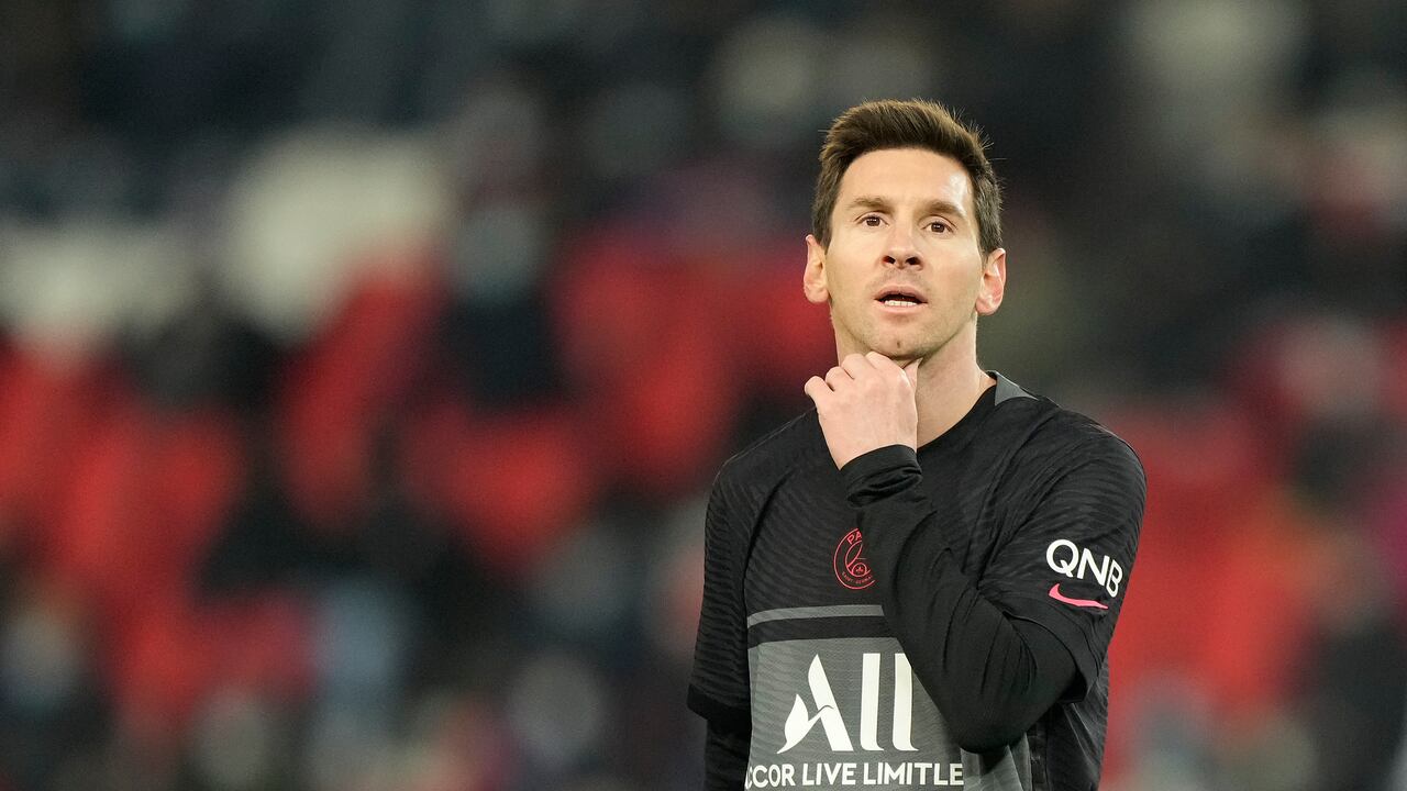 PSG's Lionel Messi pauses during the French League One soccer match between Paris Saint Germain and Reims at the Parc des Princes in Paris, Sunday, Jan. 23, 2022. (AP Photo/Francois Mori)