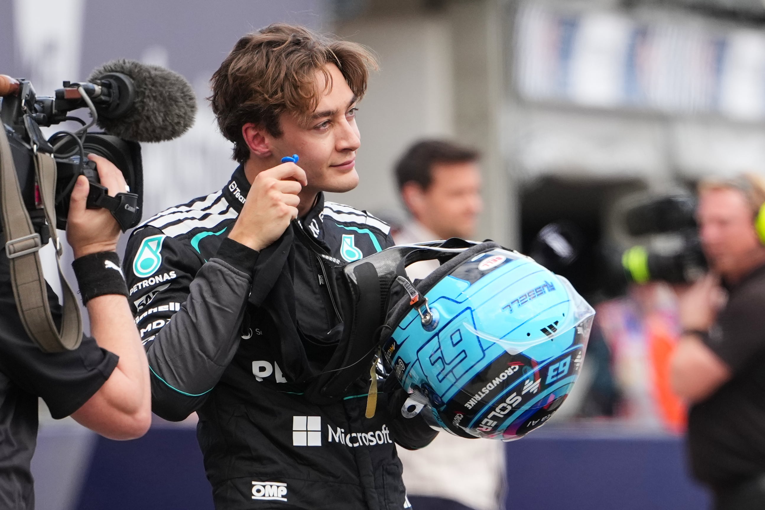 Mercedes driver George Russell of Britain reacts after winning the qualifying session for the Australian Formula One Grand Prix at Albert Park, in Melbourne, Australia, Saturday, March 7, 2026. (AP Photo/Asanka Brendon Ratnayake)