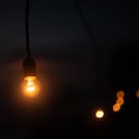 retro lamp shines on a dark background of night