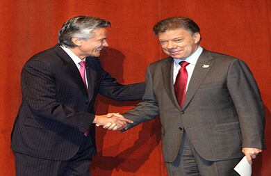 Ramiro Osorio y Juan Manuel Santos.