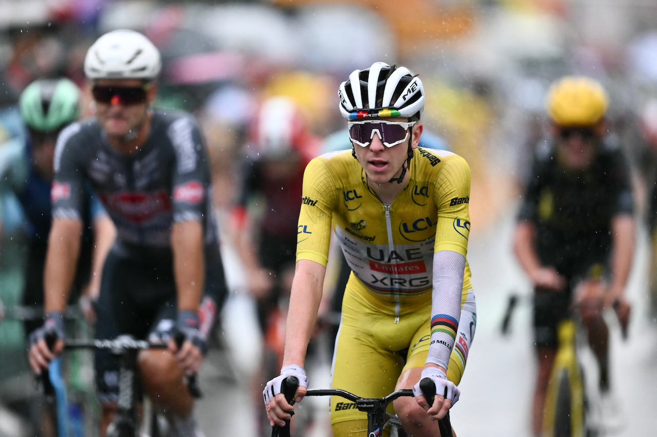 UAE Team Emirates - XRG team's Slovenian rider Tadej Pogacar wearing the overall leader's yellow jersey cycles to the finish line of the 17th stage of the 112th edition of the Tour de France cycling race, 160.4 km between Bollene and Valence, southern France, on July 23, 2025. (Photo by Marco BERTORELLO / AFP)