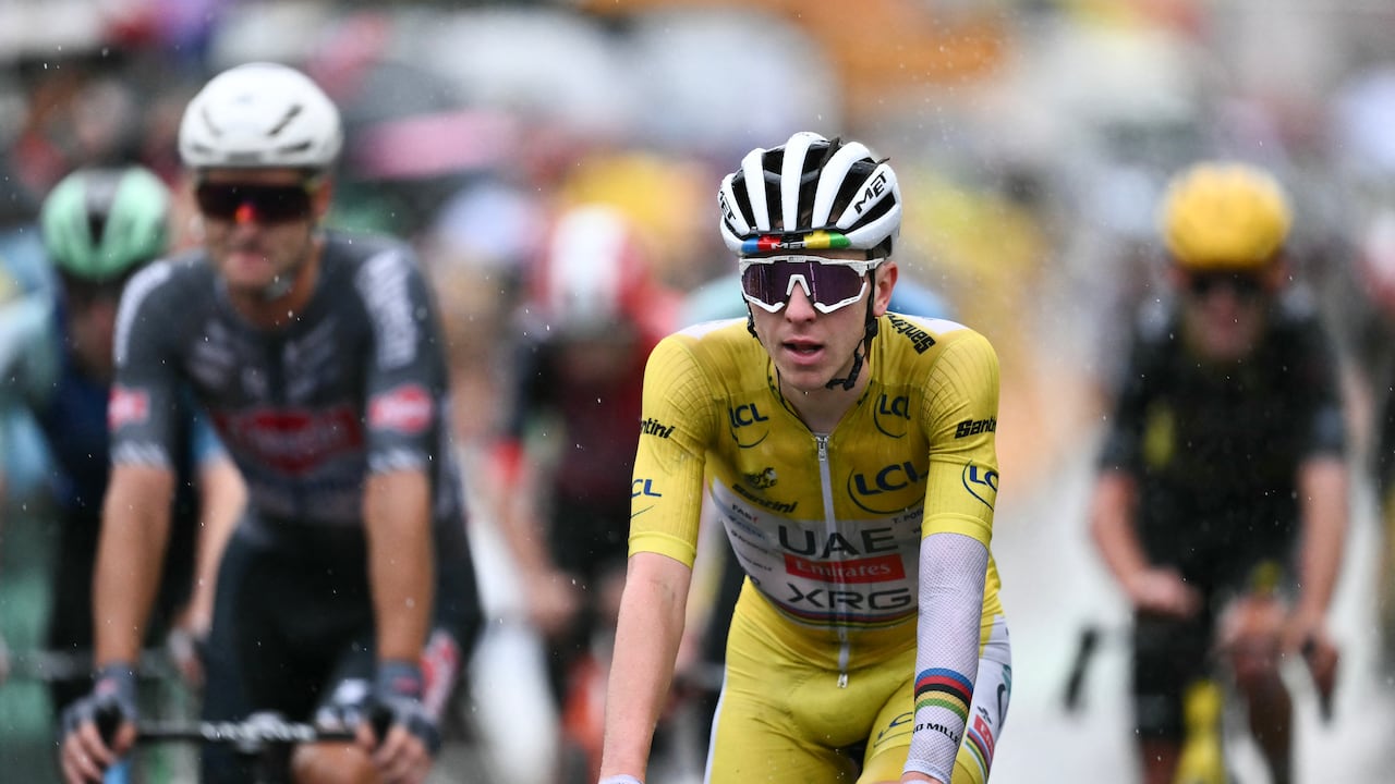 UAE Team Emirates - XRG team's Slovenian rider Tadej Pogacar wearing the overall leader's yellow jersey cycles to the finish line of the 17th stage of the 112th edition of the Tour de France cycling race, 160.4 km between Bollene and Valence, southern France, on July 23, 2025. (Photo by Marco BERTORELLO / AFP)